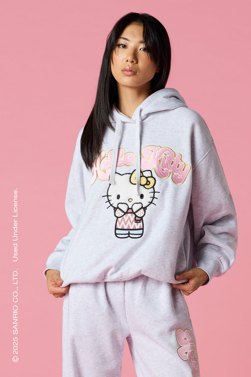 Haut à capuchon avec motif brodé Hello Kitty® des fêtes