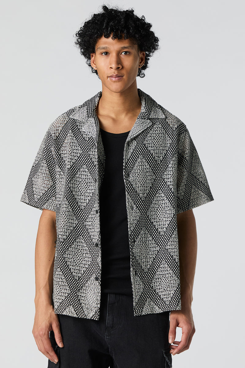 Haut texturé à losange boutonné