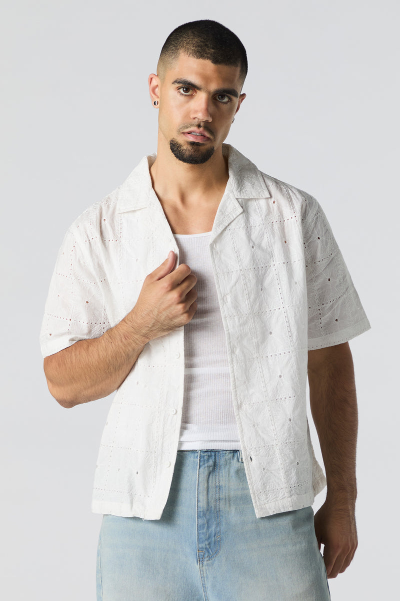 Haut boutonné à broderie florale