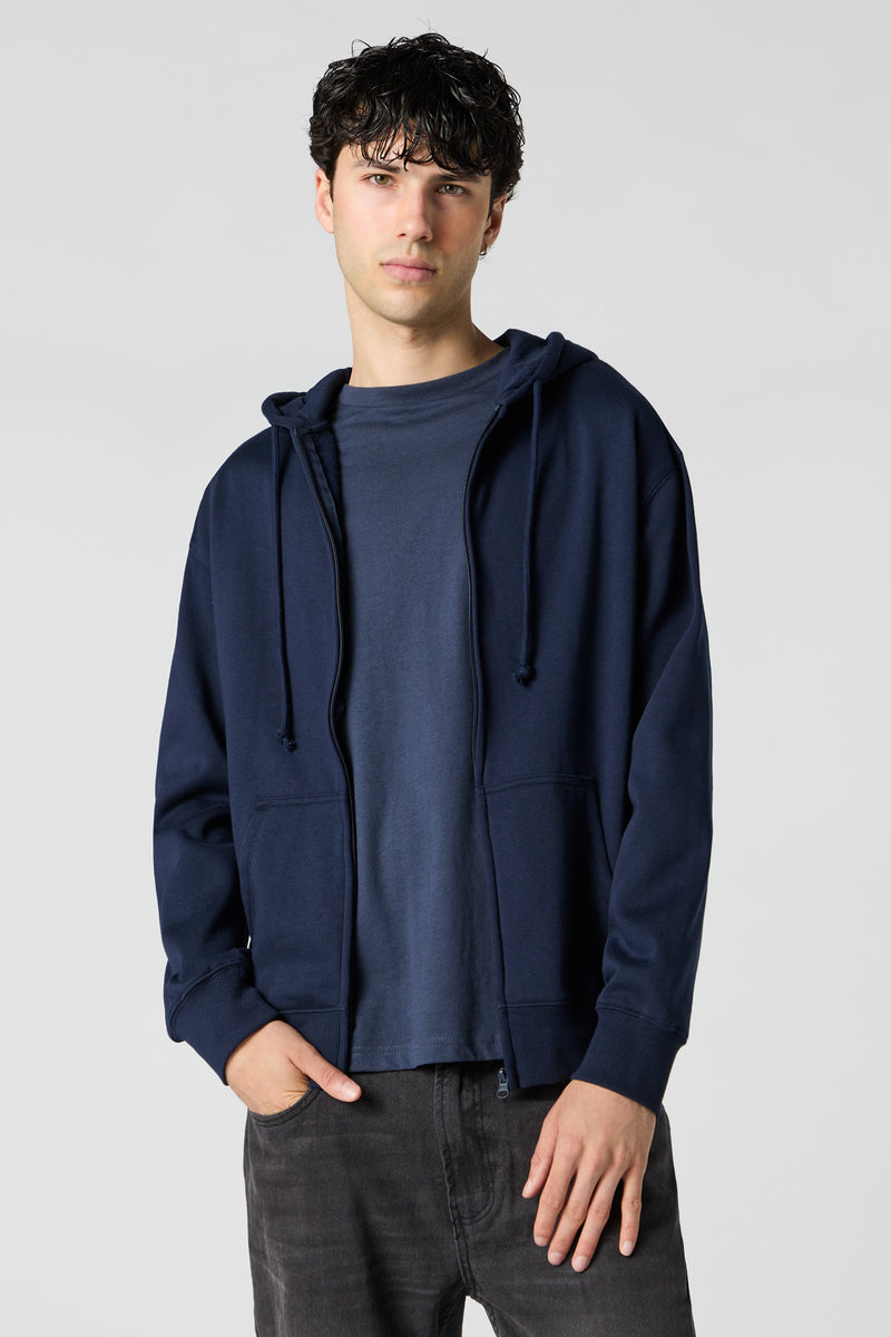 Haut à capuchon en molleton avec fermeture à glissière