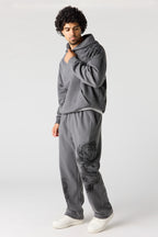Pantalon d'entraînement à jambe large en molleton imprimé