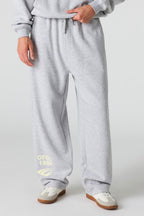 Pantalon d'entraînement baggy en molleton imprimé