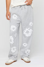 Pantalon d'entraînement ample en molleton imprimé