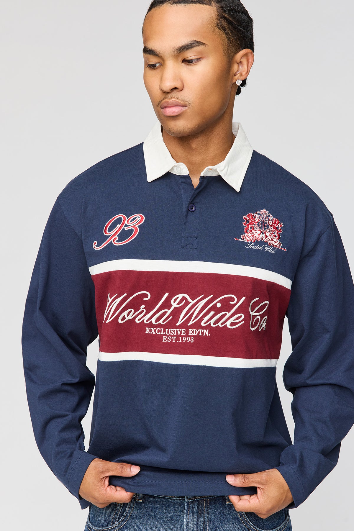 Vue alternative 4. Chemise polo à manches longues avec blocs de couleurs et motif brodé