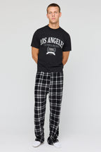Ensemble pyjama avec t-shirt imprimé et pantalon en peluche à carreaux