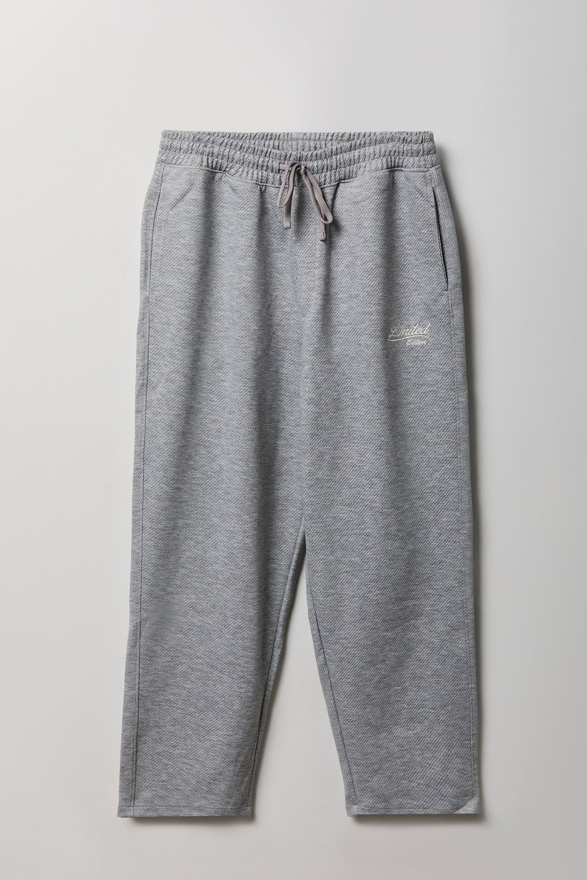 Pantalon d'entraînement texturé avec motif brodé