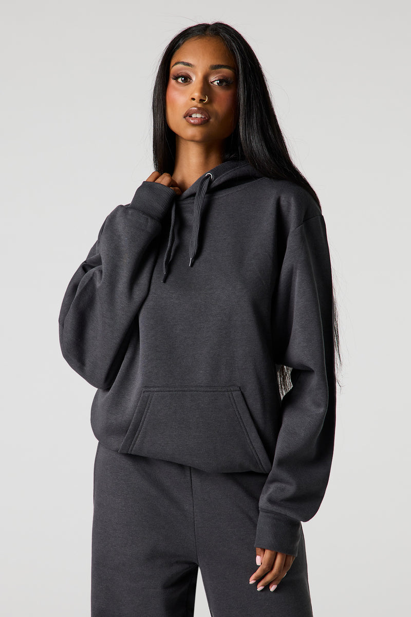 Haut surdimensionné à capuchon en molleton