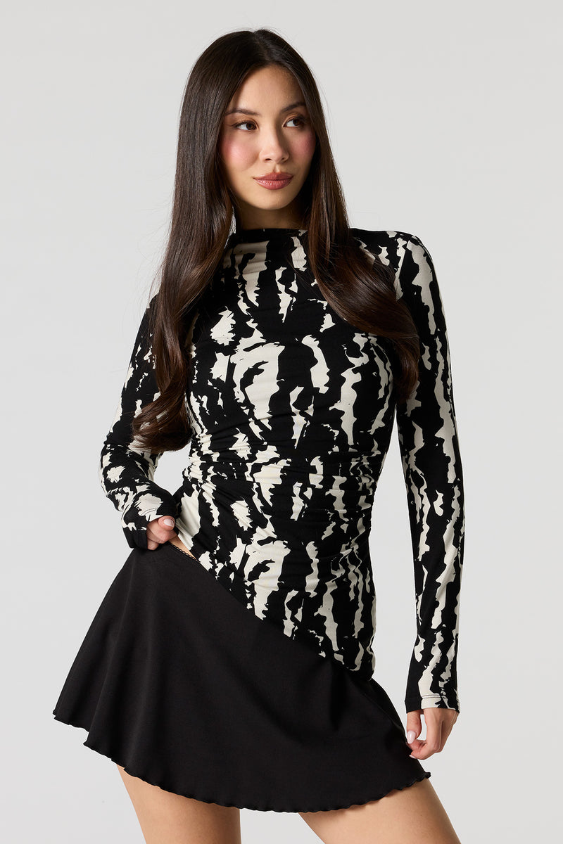 Haut asymétrique ruché à encolure bateau avec manches longues