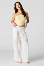 Pantalon à jambe large avec taille smockée