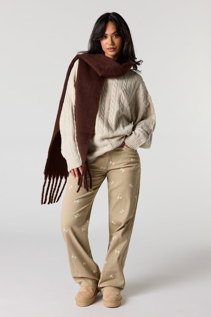 Pantalon à jambe large avec poches ornées de boucles