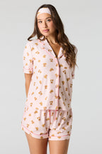 Ensemble pyjama avec haut boutonné imprimé et short