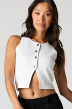 Veste en tricot avec boutons métallisés