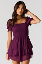 Minirobe smockée en chiffon avec manches bouffantes