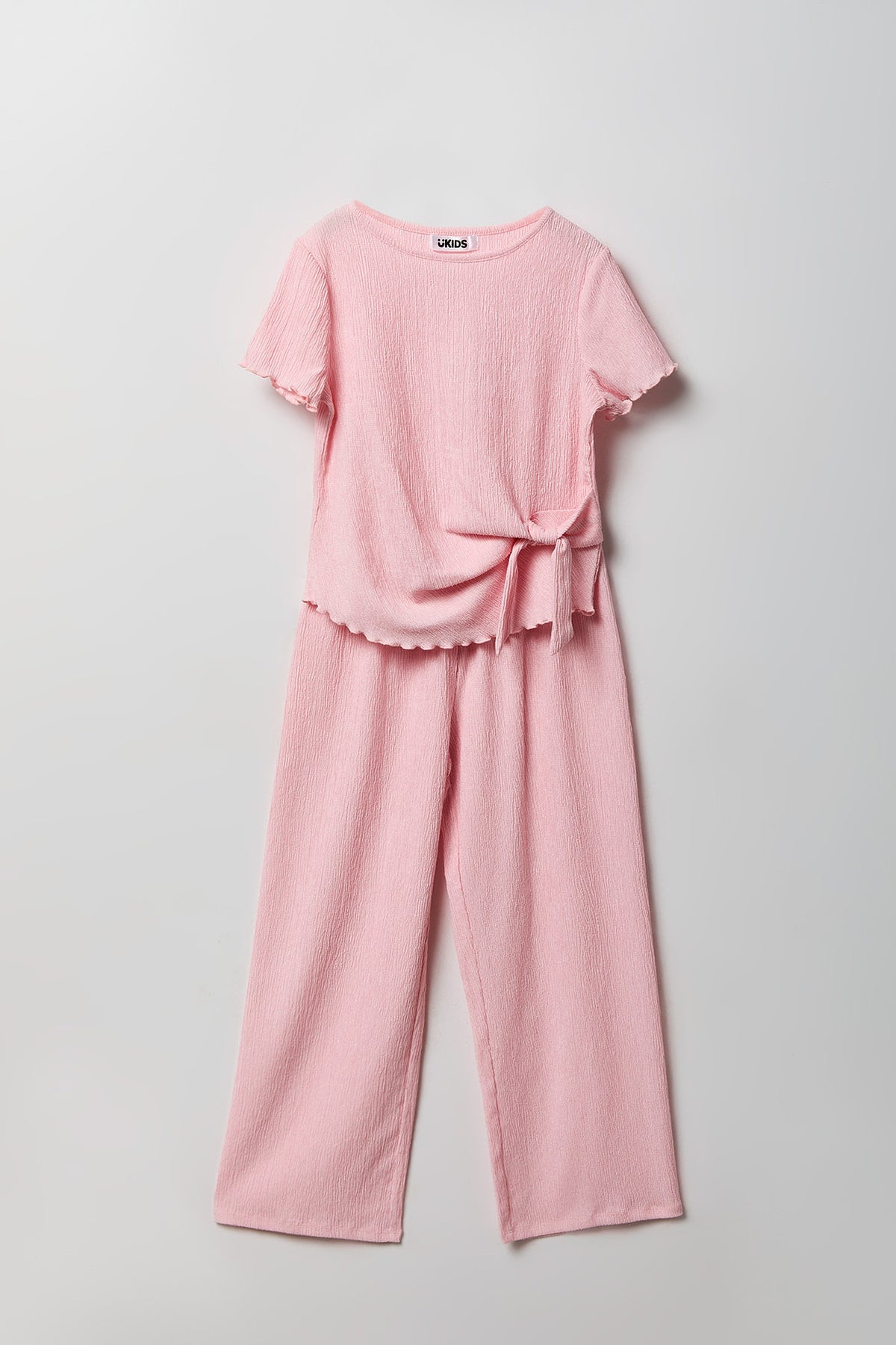 Ensemble avec haut texturé à attaches latérales et pantalon pour fille