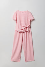 Ensemble avec haut texturé à attaches latérales et pantalon pour fille