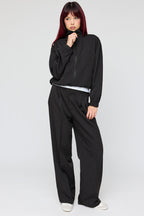 Pantalon habillé à jambe large et fines rayures