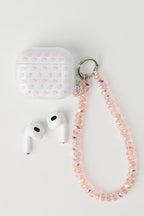 Ensemble avec écouteurs Bluetooth et accessoire
