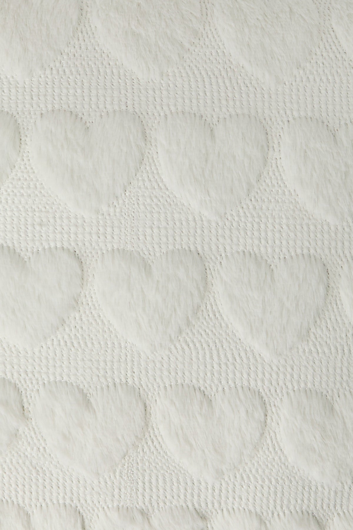 Vue alternative 2. Coussin Coeur texturé en peluhe