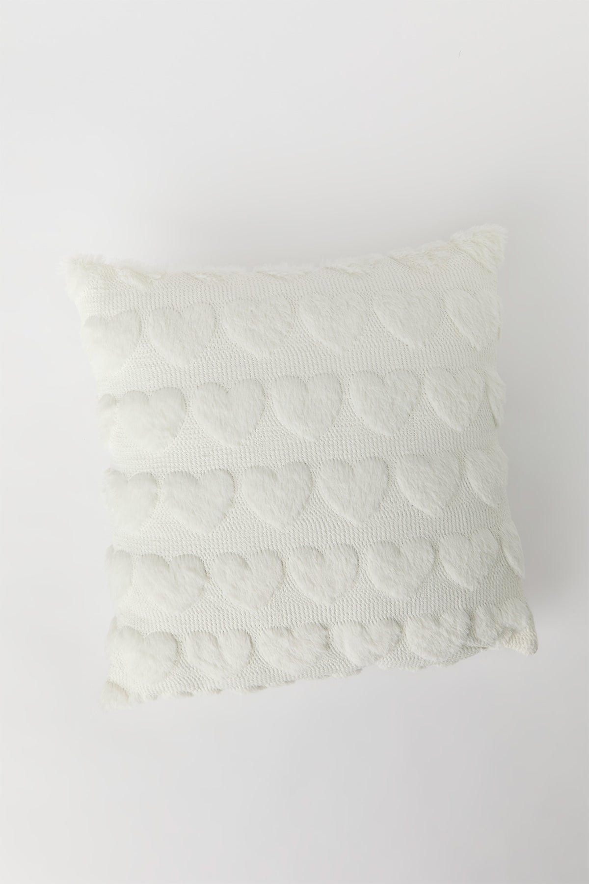 Coussin Coeur texturé en peluhe