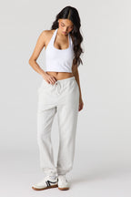 Jogger en tissu bouclé de luxe à taille basse