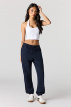 Jogger en tissu bouclé de luxe à taille basse