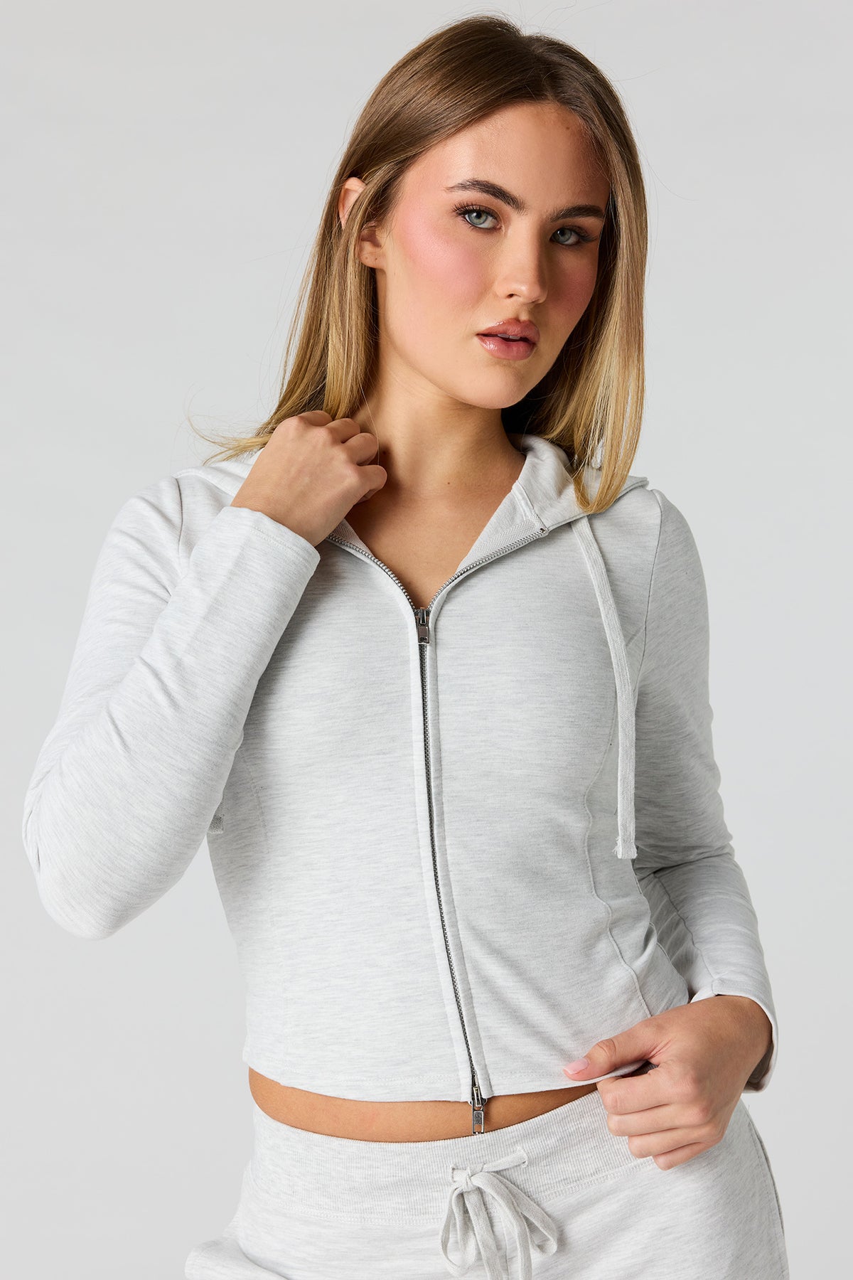 Haut à capuchon Active en tissu bouclé avec fermeture à glissière