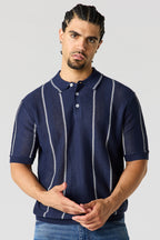 Polo en tricot texturé rayé
