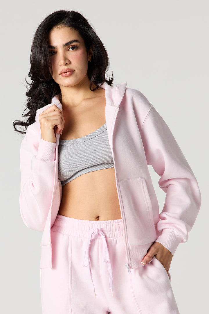 Haut à capuchon en molleton uni avec fermeture à glissière