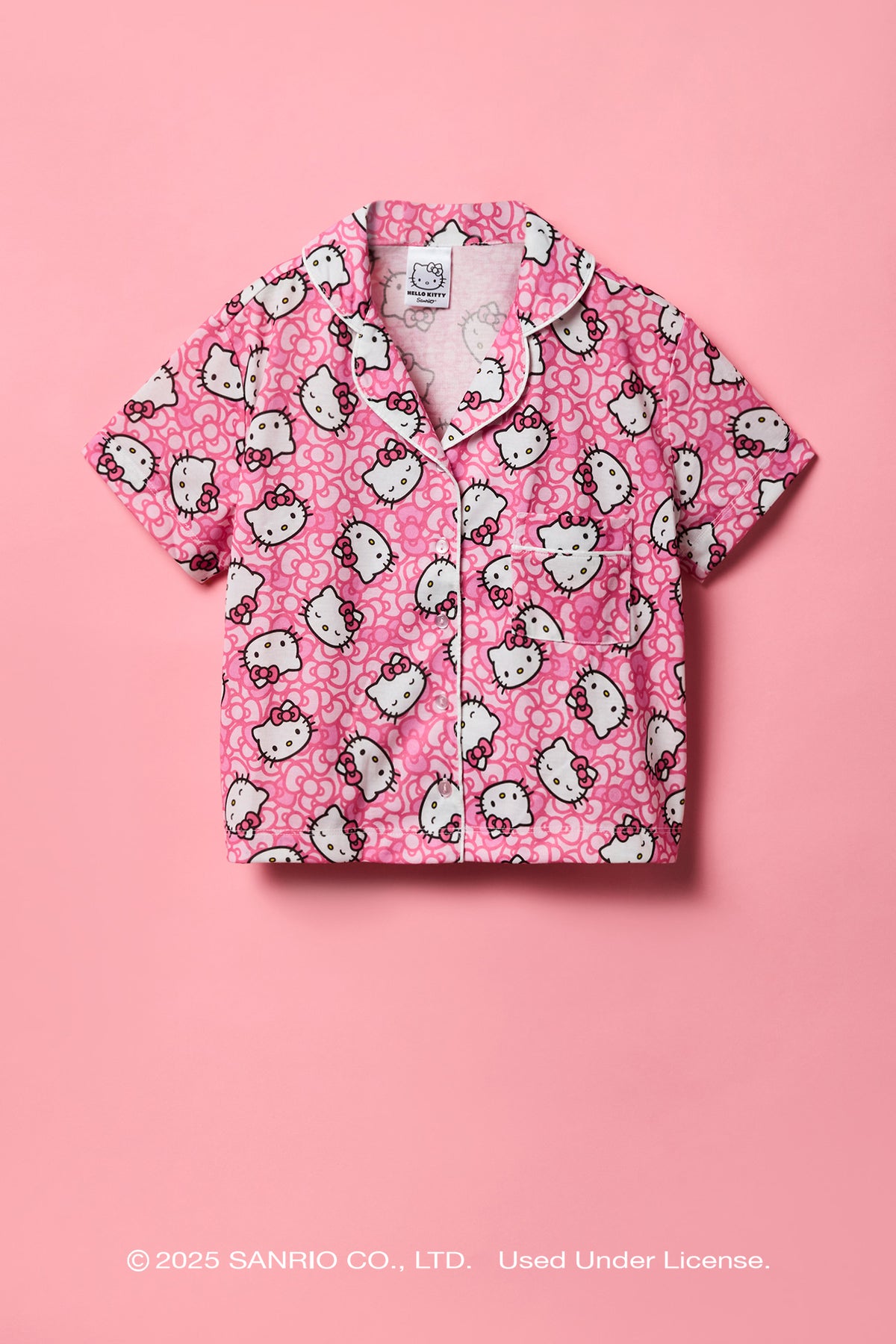 Alt View 2. Hello Kitty® Girls Button-Up Top & Pant Pajama Set - Pink