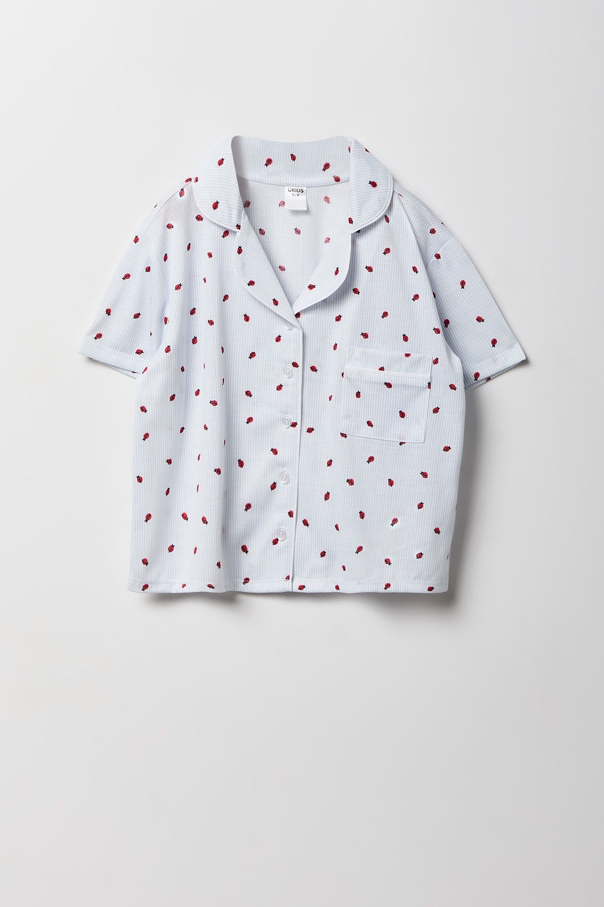 Vue alternative 2. Ensemble pyjama avec haut boutonné imprimé et short pour fille