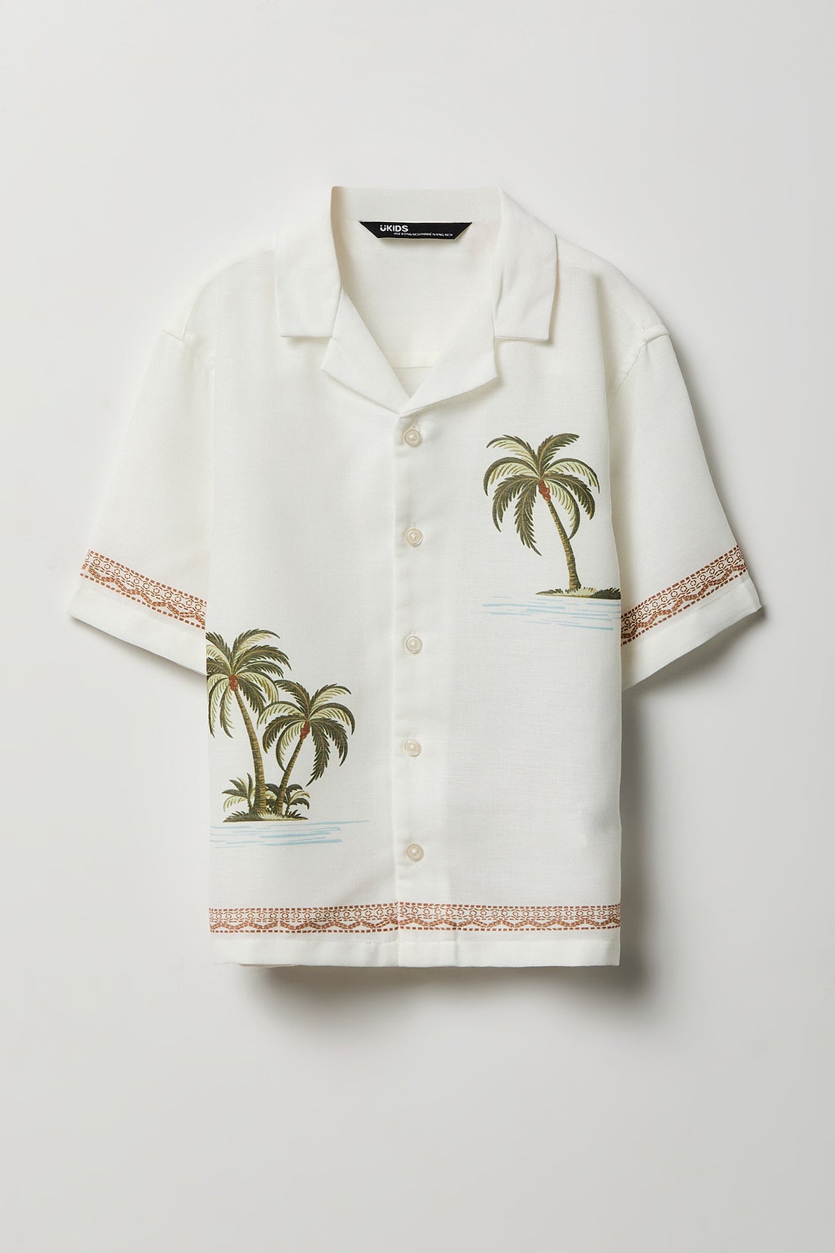 Haut carré boutonné avec motif tropical pour garçon