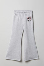 Pantalon d'entraînement à jambe évasée en molleton avec motif brodé pour fille