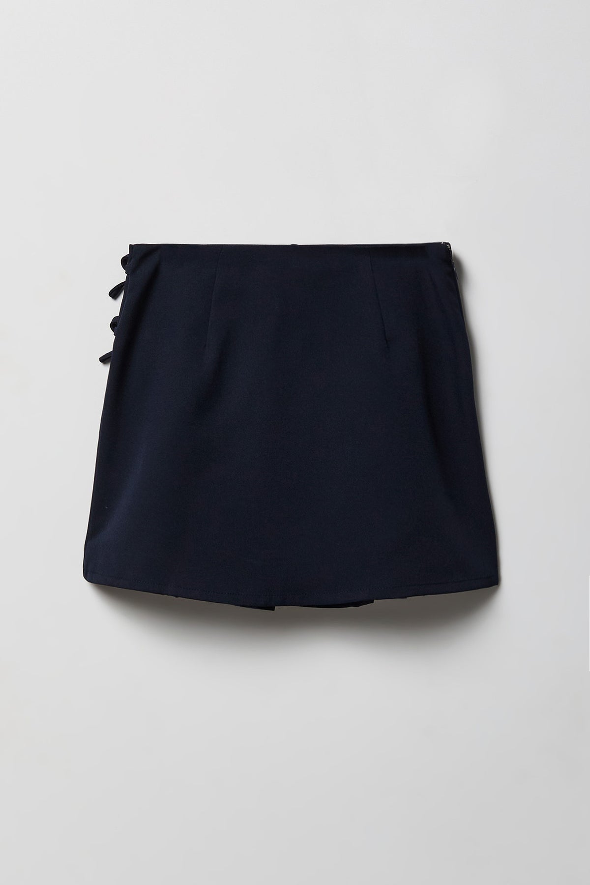 Alt View 2. Girls Bow Pleated Skirt - Navy