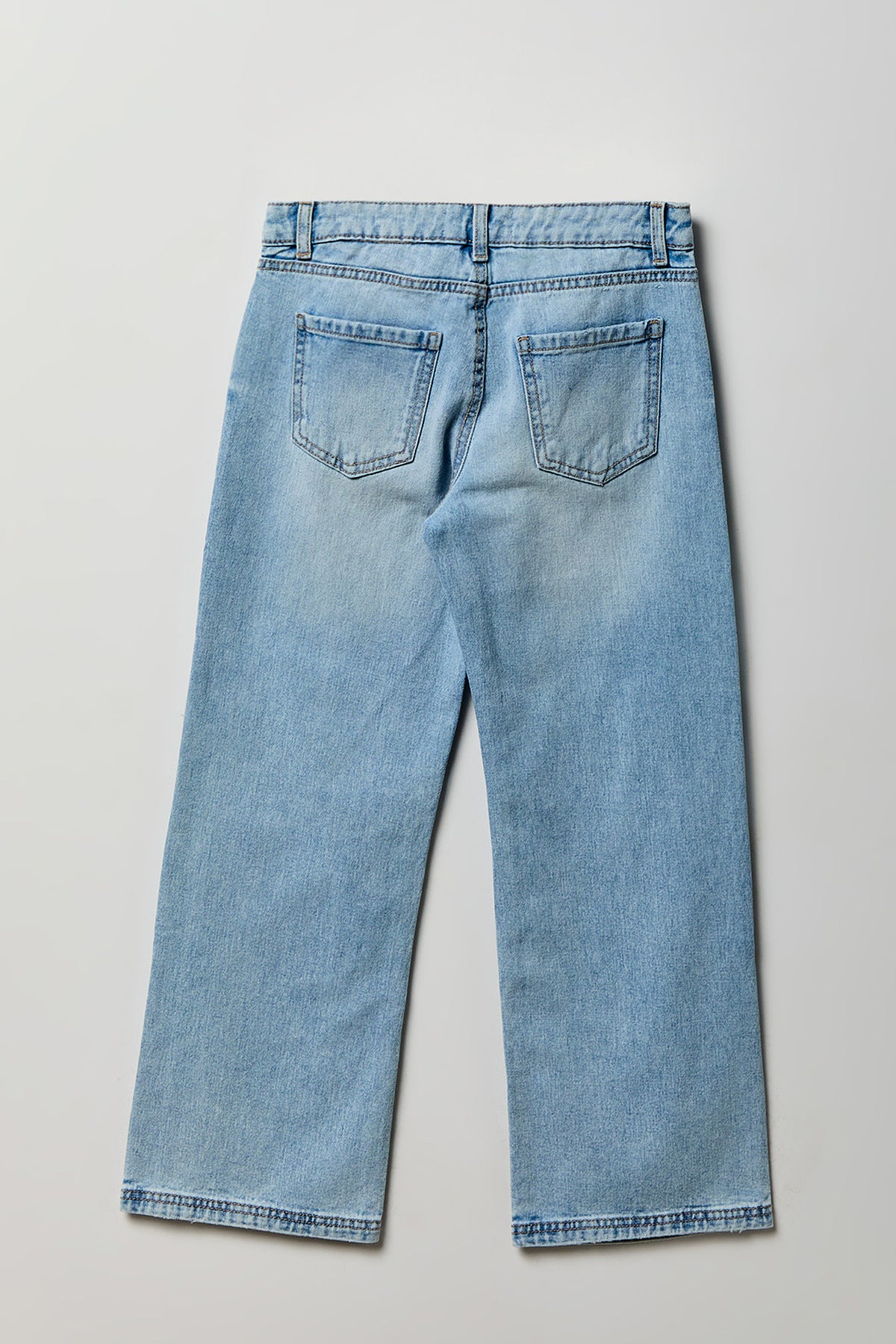 Alt View 2. Girls Low Rise Baggy Light Jean - Light Denim Blue