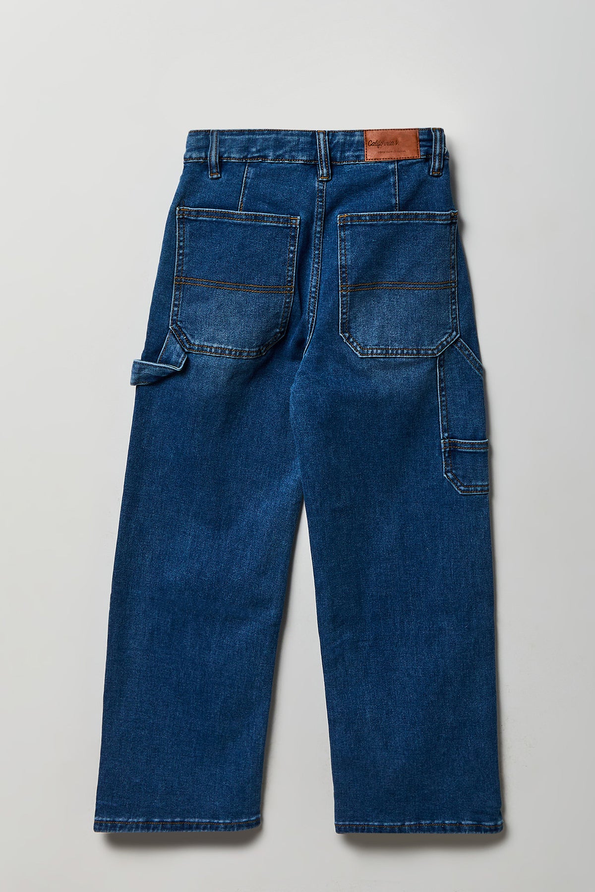 Alt View 2. Boys Stretch Loose Fit Carpenter Jean - Medium Denim Blue