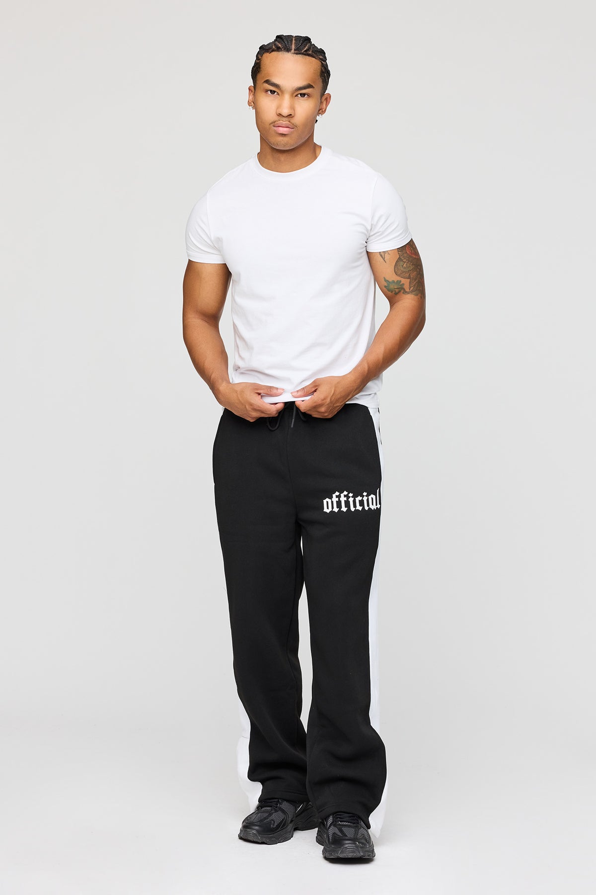 Alt View 2. Graphic Fleece Sweatpant - Black