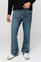 Jean extensible à jambe semi-évasée