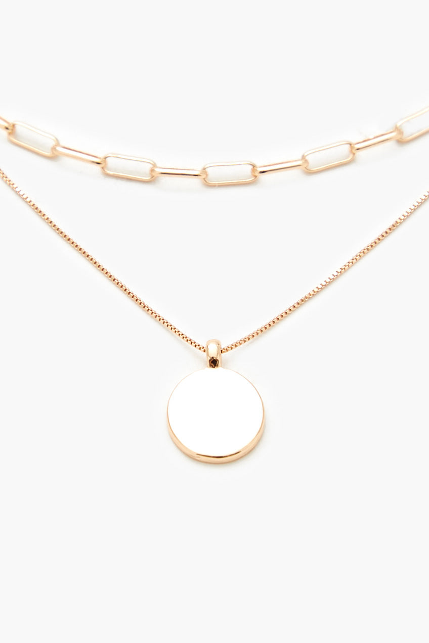 Collier superposé avec breloque ronde